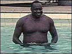 Idi Amin in a swimming pool